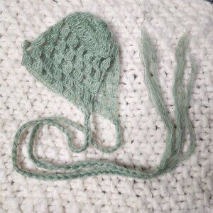 Green knit newborn bonnet